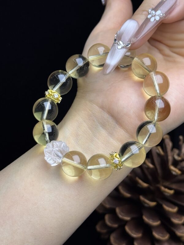 _cgi-bin_mmwebwx-bin_webwxgetmsgimg__&MsgID=4399586310822386661&skey=@crypt_9fab49d6_311dc6fd0942d173fcf55c0c4087eddd&mmweb_appid=wx_webfilehelper Elegance in Harmony: Yellow Crystal and Lotus Crystal Bracelet – Embrace the Power of Water Element"
