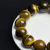 7afa838fb12914658bca40a6f8588af0 Natural Tiger Eye Beaded Bracelet Strength · Confidence · Grounded Protection