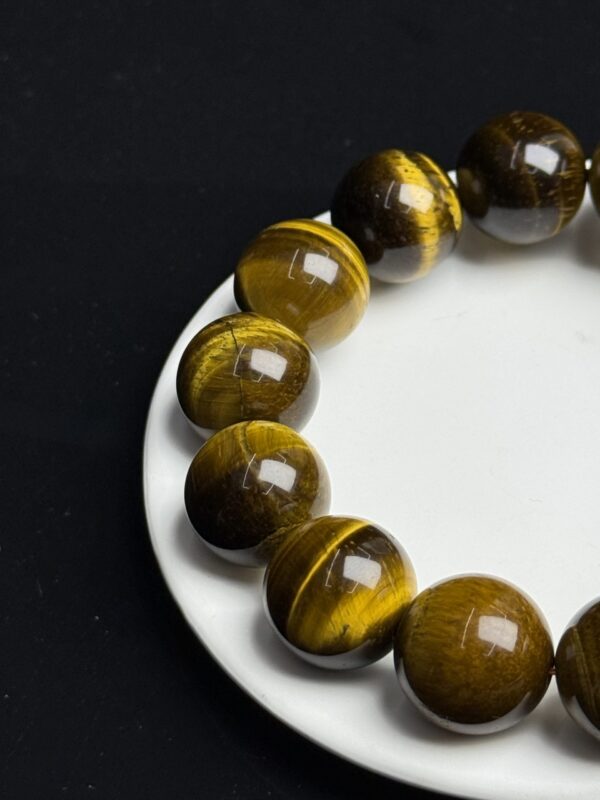 7afa838fb12914658bca40a6f8588af0 Natural Tiger Eye Beaded Bracelet Strength · Confidence · Grounded Protection