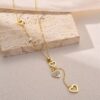 05e798909aa517d720b01d5ab39e9ca9 Golden Heart Tassel Necklace