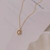 09b9a9cd0ee85245eddd2b31bd34bf7c Aurora Pearl Titanium Necklace