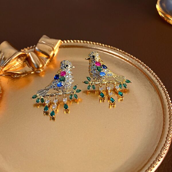 385acae55fc78e378f010dc96d5d29e4 Golden Crystal Encrusted Bird Earrings