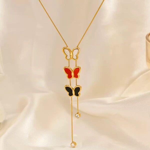 41f30953b26ce4c0e897d3eb4c4bb36f Flutter Muse Butterfly Tassel Necklace