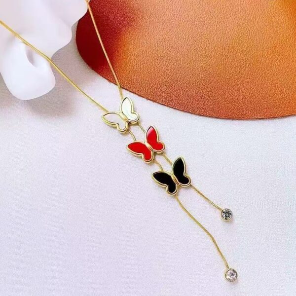 998a5074122a55fc534409652ea9cfeb Flutter Muse Butterfly Tassel Necklace