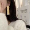 Golden Cascade Fringe Earrings