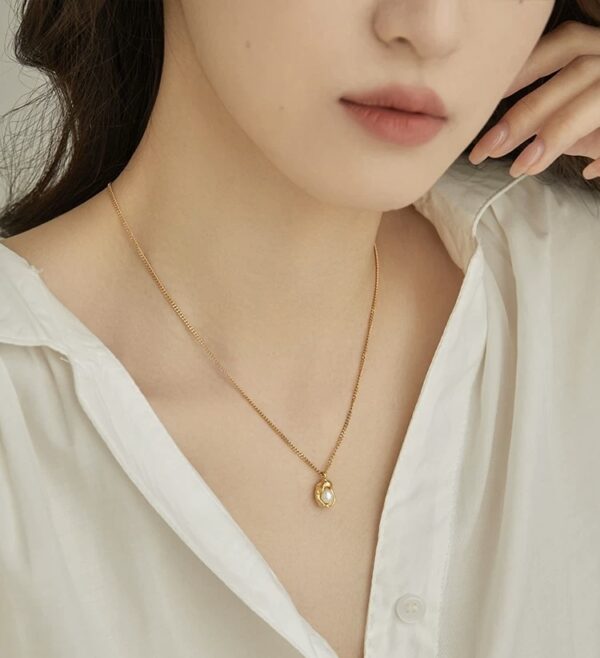 fc52bdbb9357f0f00b3da23ca437dcb5 Aurora Pearl Titanium Necklace