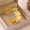 O1CN01WfM7ZH1IKnf7Wduns_!!2221176360875-0-cib.jpg_ Modern Irregular Open Bangle Bracelet – Adjustable Fit