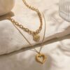 O1CN01bzZ5H025WAi1yw8Y6_!!2222347247533-0-cib Double Heart Layered Titanium Steel Necklace